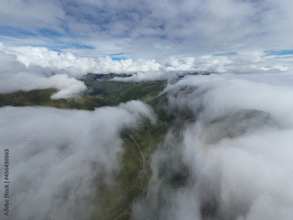 aerial view of the mountain with clouds
