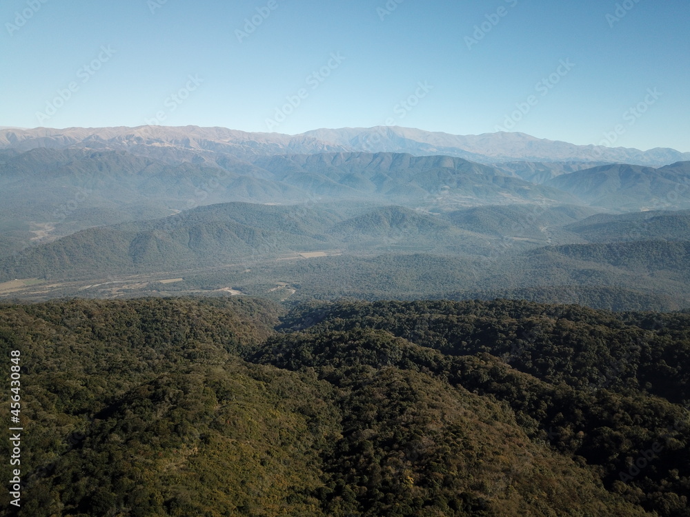 Villa Nougues area in the hills of Tucumán, town, meadow, wooded hills in autumn
