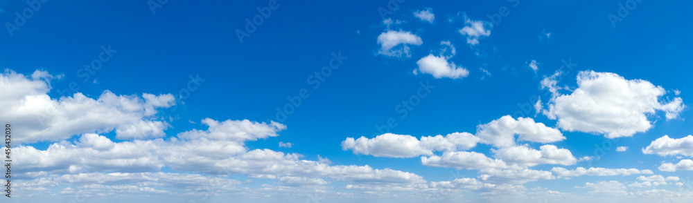 Fototapeta premium Blue Sky background with tiny Clouds. Panorama background