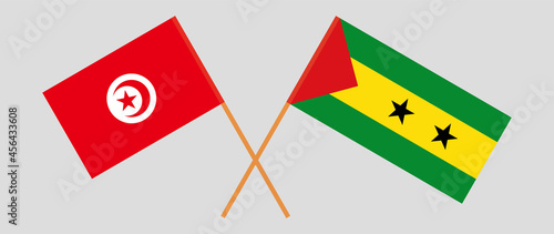 Crossed flags of Tunisia and Sao Tome and Principe. Official colors. Correct proportion