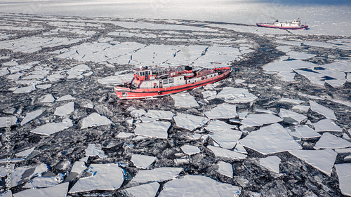 Icebreakers breaking ice in...