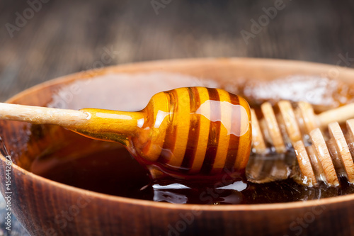 natural honey in a large wooden bowl