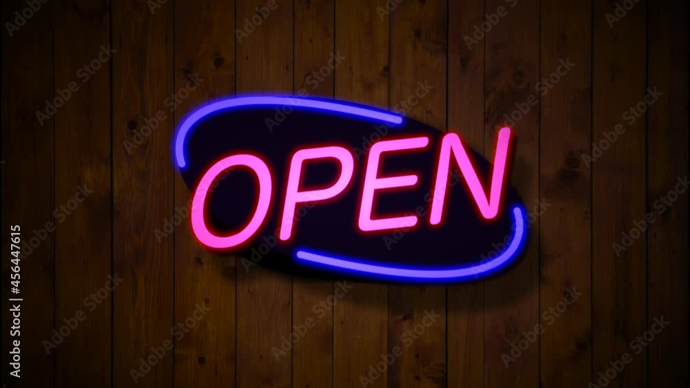Neon open sign glowing on a wall Neon open sign glowing on a wall