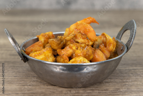 Indian flavored mushroom shrimp meat in a bowl from Indian restaurant cooked and seasoned perfectly