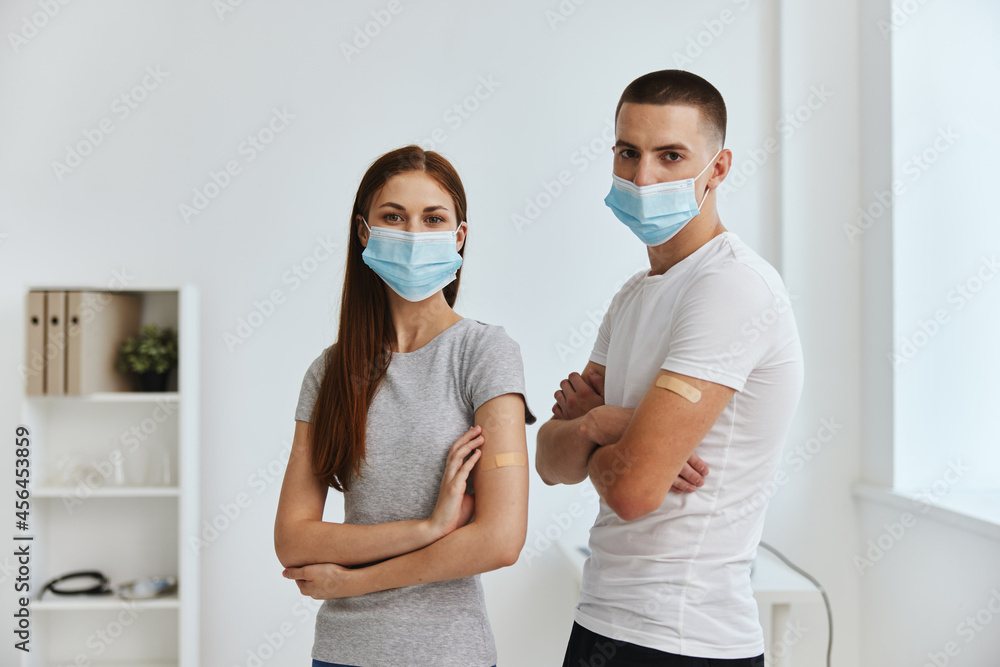 boy and young woman with injections on hands medical mask hospital immunity covid-19 passport boy and young woman with injections on hands medical mask hospital immunity covid-19 passport