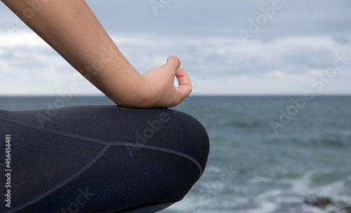 yoga pose on the beach