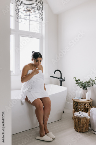 Pregnant woman getting ready after bath