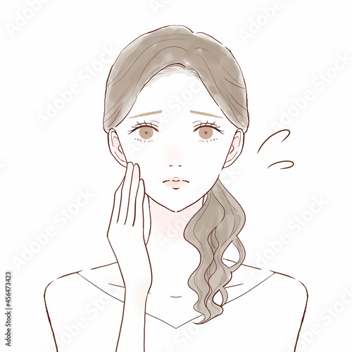 悩んでいる女性