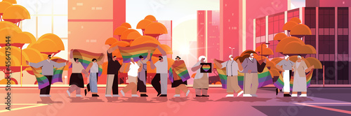 mix race senior people group holding lgbt rainbow flag gay lesbian love parade pride festival transgender love concept
