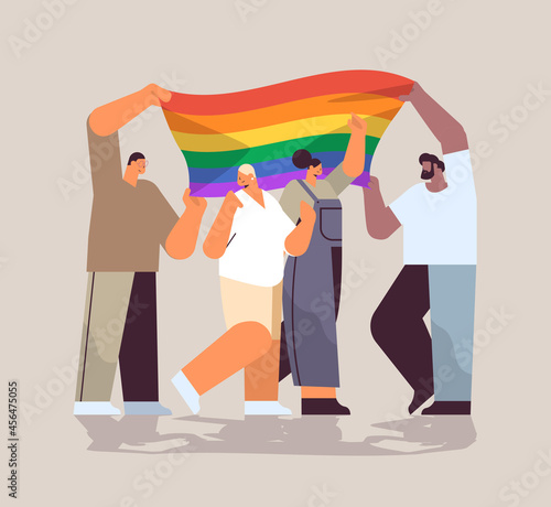 mix race people group holding lgbt rainbow flag gay lesbian love parade pride festival transgender love concept