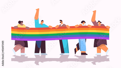mix race people group holding lgbt rainbow flag gay lesbian love parade pride festival transgender love concept