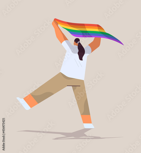 woman holding lgbt rainbow flag gay lesbian love parade pride festival transgender love concept