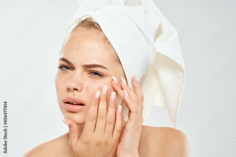woman with towel on head skin care dermatology dissatisfaction problem woman with towel on head skin care dermatology dissatisfaction problem