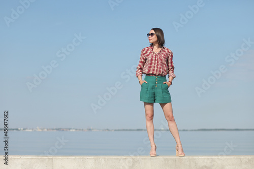 young woman in summer clothes by the sea © zhagunov_a