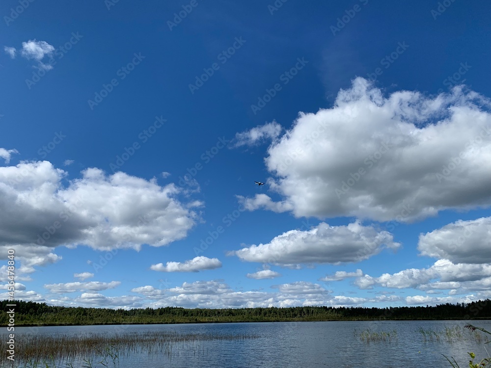lake against the blue cloudy sky