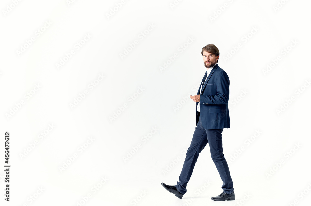 man in a jacket and tie emotions successful light background man in a jacket and tie emotions successful light background