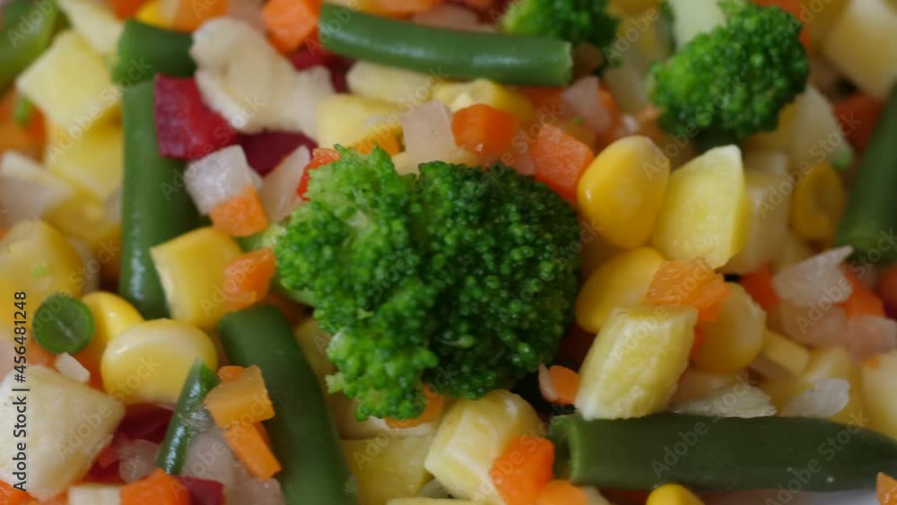 Fresh Mixed Vegetables Green Beans Corn Broccoli Red Peppers Carrots Close Up. Macro Shot Mixed Vegetables Background. Closeup Healthy Clean Eating, Organic Dieting Vegetarian Vegan Food. Fresh Mixed Vegetables Green Beans Corn Broccoli Red Peppers Carrots Close Up. Macro Shot Mixed Vegetables Background. Closeup Healthy Clean Eating, Organic Dieting Vegetarian Vegan Food.