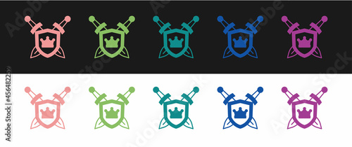 Set Medieval shield with crossed swords icon isolated on black and white background. Vector