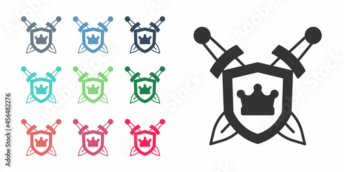 Black Medieval shield with crossed swords icon isolated on white background. Set icons colorful. Vector