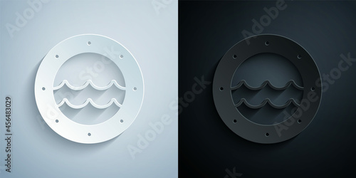 Paper cut Ship porthole with rivets and seascape outside icon isolated on grey and black background. Paper art style. Vector