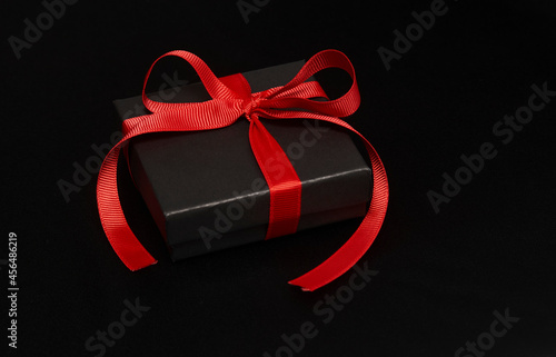 Black friday sale concept with gift box with ribbon