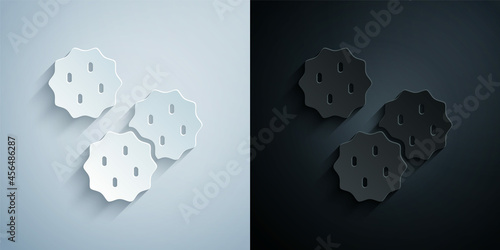 Paper cut Cookie or biscuit with chocolate icon isolated on grey and black background. Paper art style. Vector