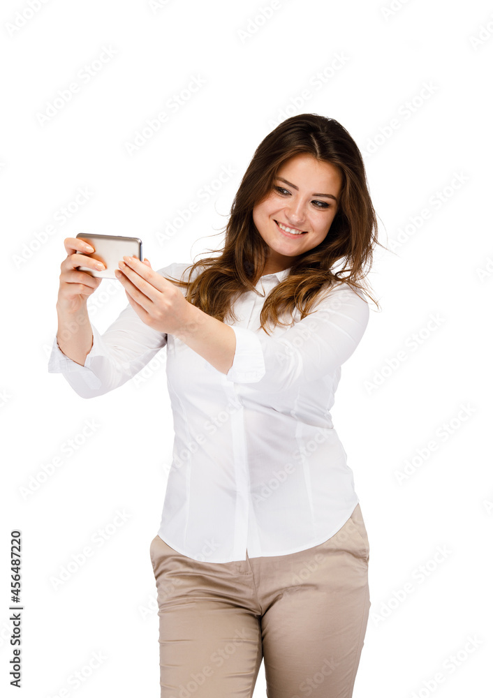 Young attractive woman using smartphone
Young attractive woman using smartphone