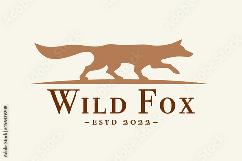 Wild fox silhouette logo design. Canine wildlife sign. Wilderness animal brand icon. Vector illustration.