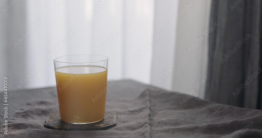 orange juice in tumbler glass orange juice in tumbler glass