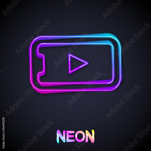 Glowing neon line Online play video icon isolated on black background. Smartphone and film strip with play sign. Vector