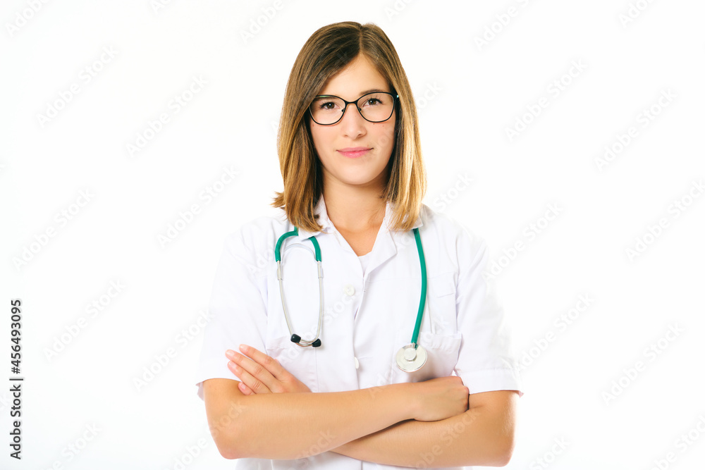 Studio portrait of young female doctor posing on white background Studio portrait of young female doctor posing on white background