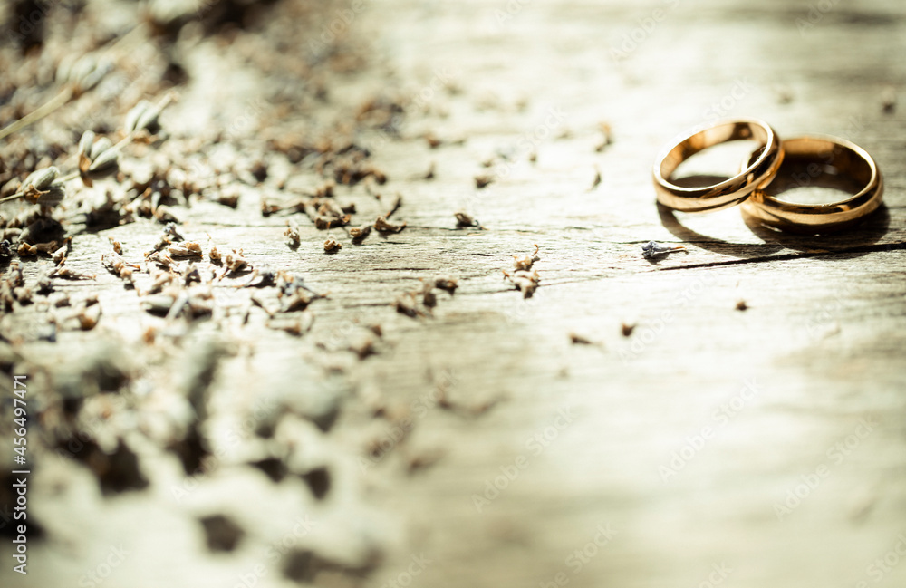 wedding rings on a wooden background wedding rings on a wooden background