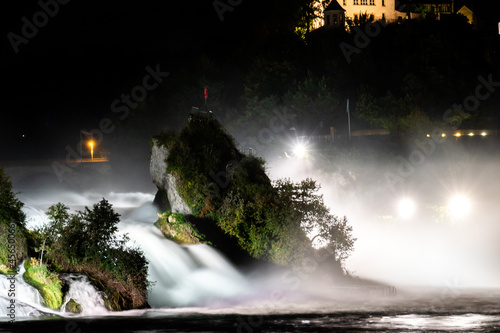 The famous Rheinfall in Switzerland on a late-summer night photo