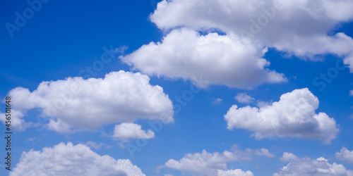 Clouds with blue sky background. abstract white fluffy clear ozone air in morning day. nature wallpaper or environment concept.