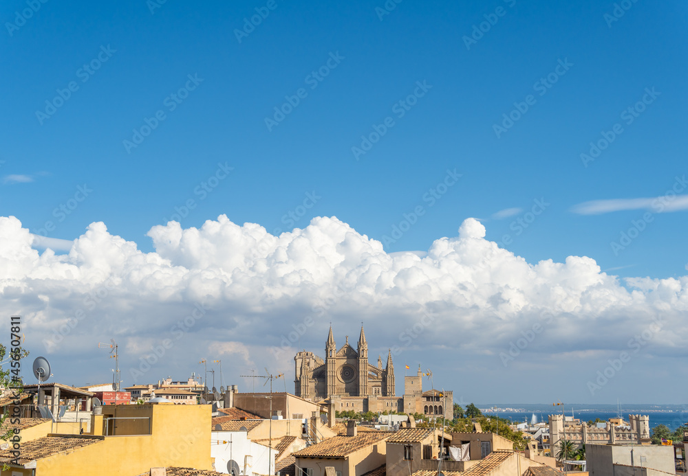 General view of the city of Palma de Mallorca with the Cathedral of Palma in the background at sunset