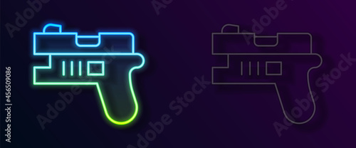 Glowing neon line Futuristic space gun blaster icon isolated on black background. Laser Handgun. Alien Weapon. Vector