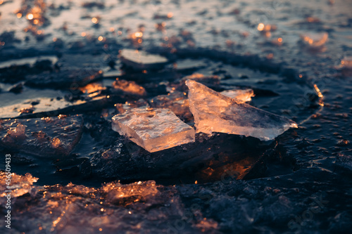 Broken ice on the lake in the morning