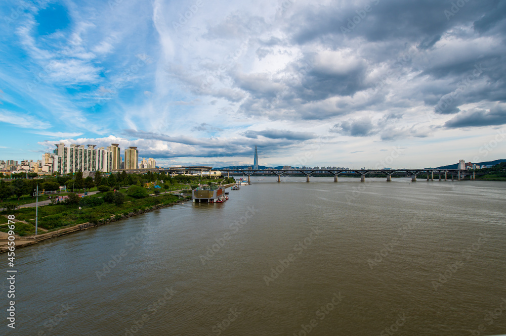 clear weatherday in Jamsil - distant wide-angle panoramic view from the han riverbank seoul city south korea