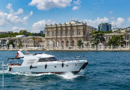 Yacht on a Dolmabahce Palace background in Istanbul, Turkey © Sergey Fedoskin