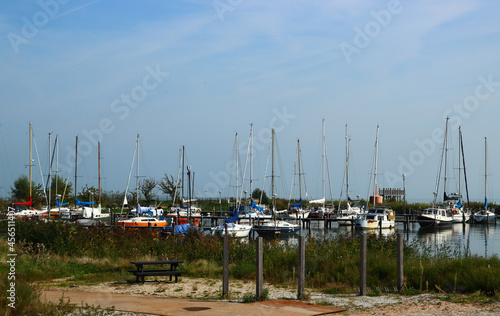 Dutch landscape. Boats on water. Blue sky, sunny day photo. North Holland landscapes.  © Maya