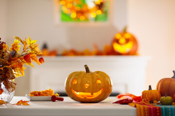 Family carving pumpkin for Halloween