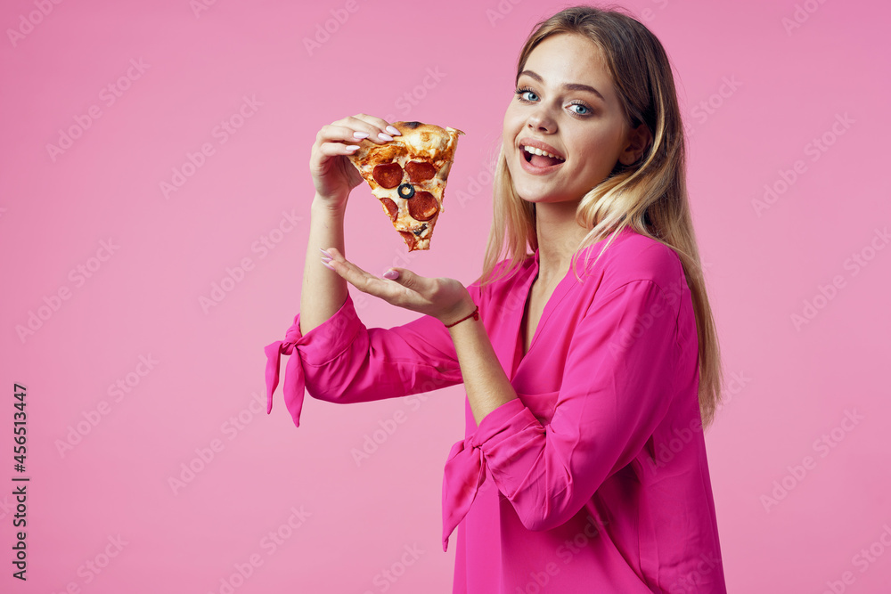 cheerful blonde with pizza in her hands junk food snack pink background cheerful blonde with pizza in her hands junk food snack pink background