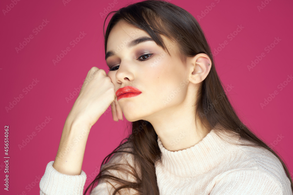 brunette with red lips in white sweater cosmetics lifestyle isolated background brunette with red lips in white sweater cosmetics lifestyle isolated background