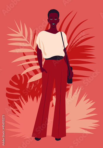 Portrait of an African woman who stands in full height with shoulder bag. Casual outfit. Vector flat illustration © moremar