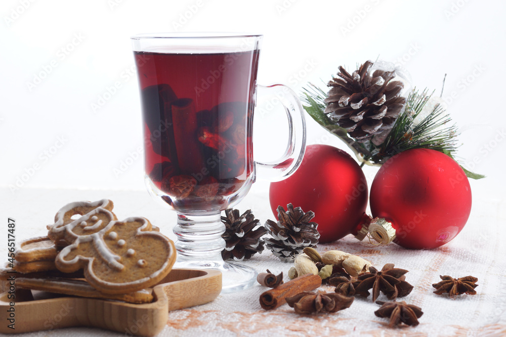 Mulled wine and cookies on the table on a light background Mulled wine and cookies on the table on a light background