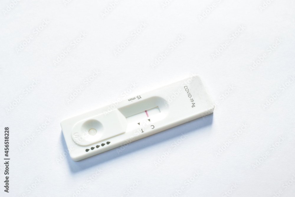 antigen test kit for checking COVID-19 or coronavirus with negative result on white background antigen test kit for checking COVID-19 or coronavirus with negative result on white background