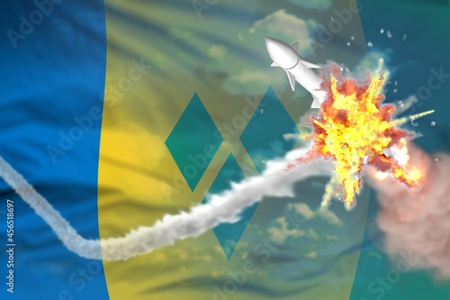 Saint Vincent and the Grenadines intercepted ballistic missile, modern antirocket destroys enemy missile concept, military industrial 3D illustration with flag photo