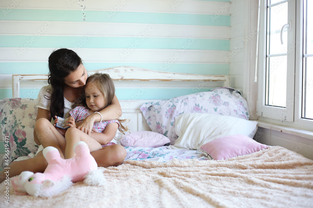 Morning idleness. Mom and daughter have fun. Morning idleness. Mom and daughter have fun.