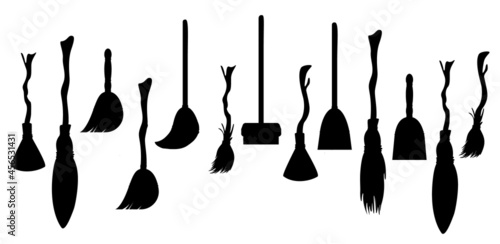 Vector image of a set of black silhouettes of brooms in simple style isolated on white background. EPS 10