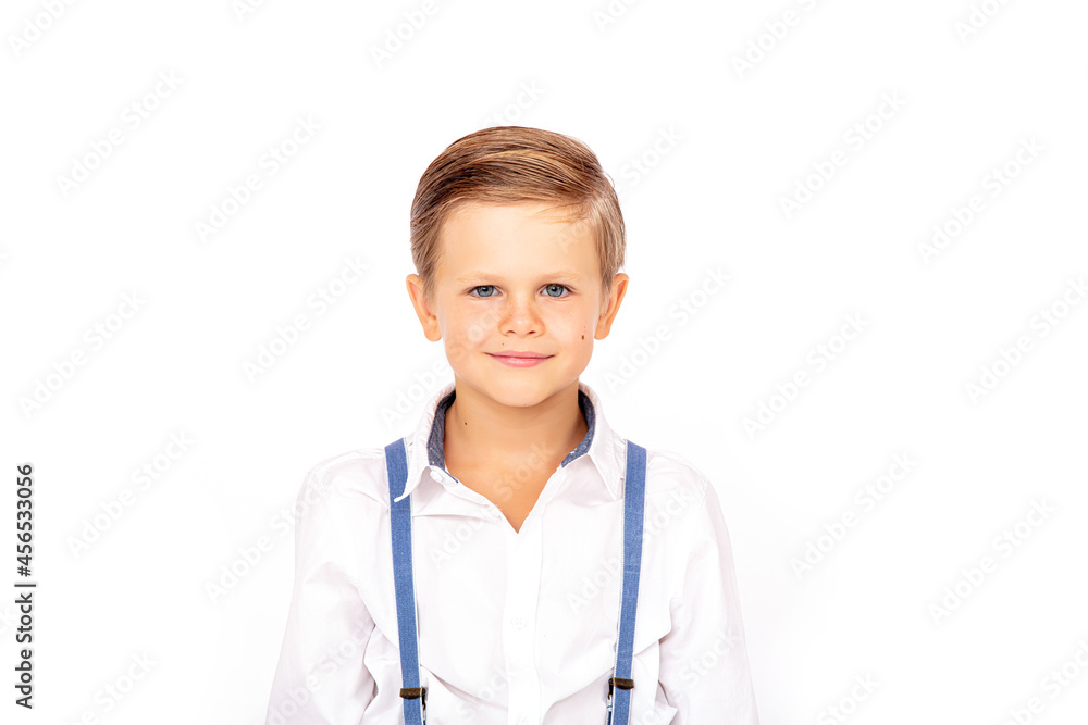Cute boy child stylish in a white shirt on a white isolated background Cute boy child stylish in a white shirt on a white isolated background